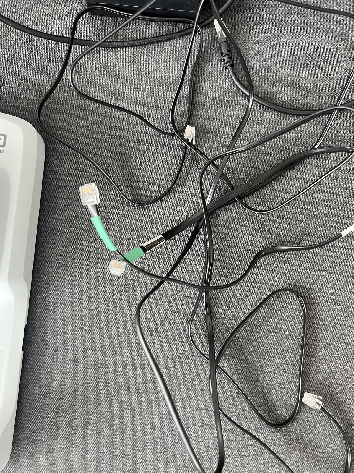 Included cables, photographed with the printer